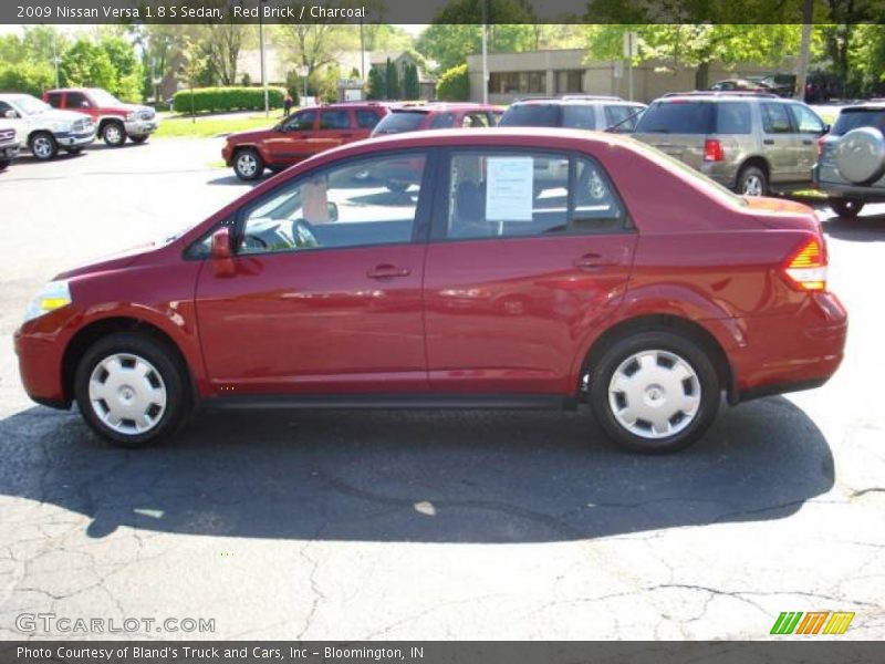 Red Brick / Charcoal 2009 Nissan Versa 1.8 S Sedan