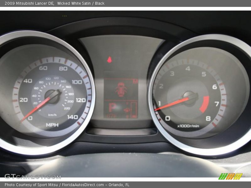 Wicked White Satin / Black 2009 Mitsubishi Lancer DE