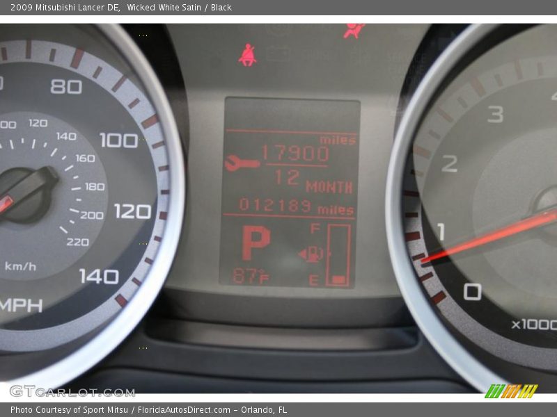 Wicked White Satin / Black 2009 Mitsubishi Lancer DE