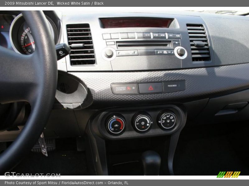 Wicked White Satin / Black 2009 Mitsubishi Lancer DE