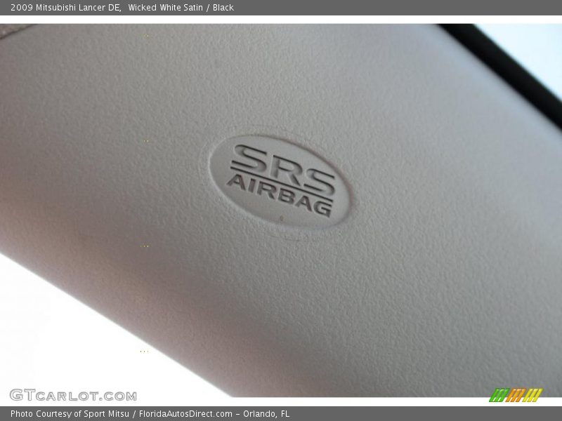 Wicked White Satin / Black 2009 Mitsubishi Lancer DE