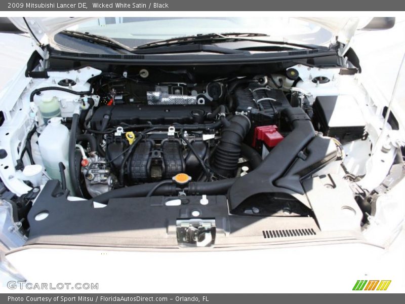 Wicked White Satin / Black 2009 Mitsubishi Lancer DE