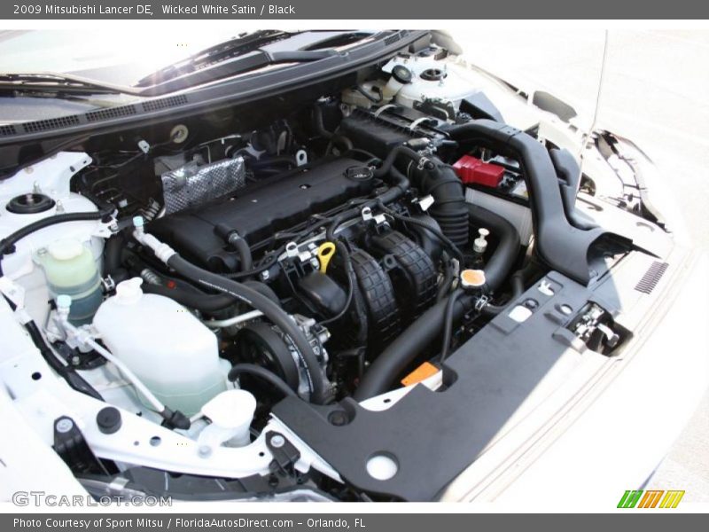 Wicked White Satin / Black 2009 Mitsubishi Lancer DE