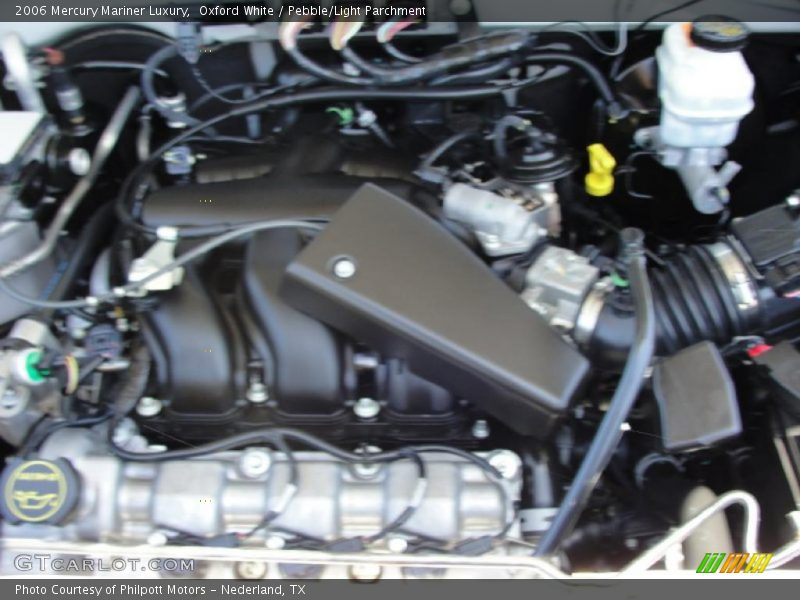 Oxford White / Pebble/Light Parchment 2006 Mercury Mariner Luxury