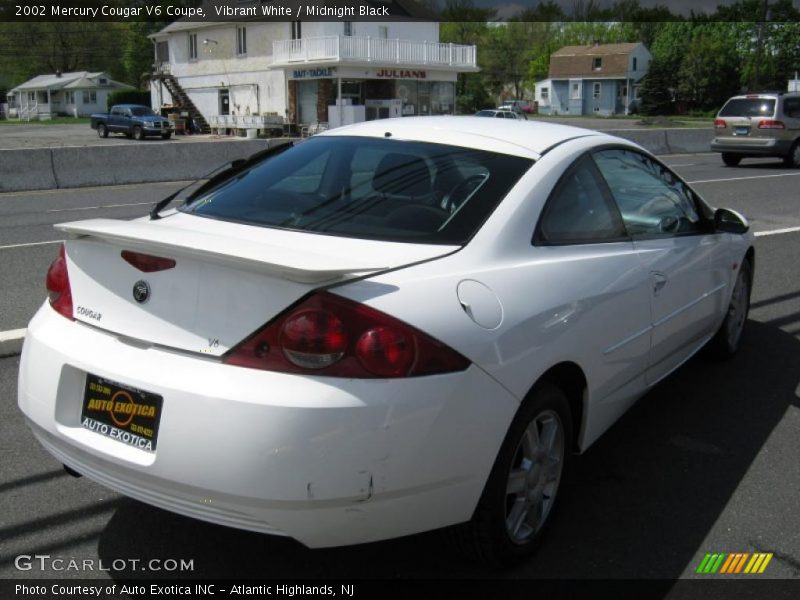 Vibrant White / Midnight Black 2002 Mercury Cougar V6 Coupe