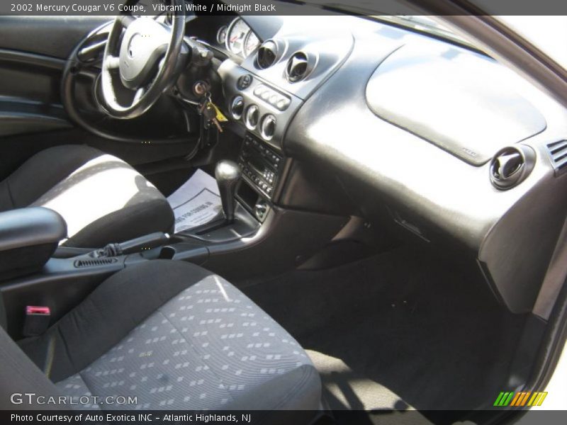 Vibrant White / Midnight Black 2002 Mercury Cougar V6 Coupe