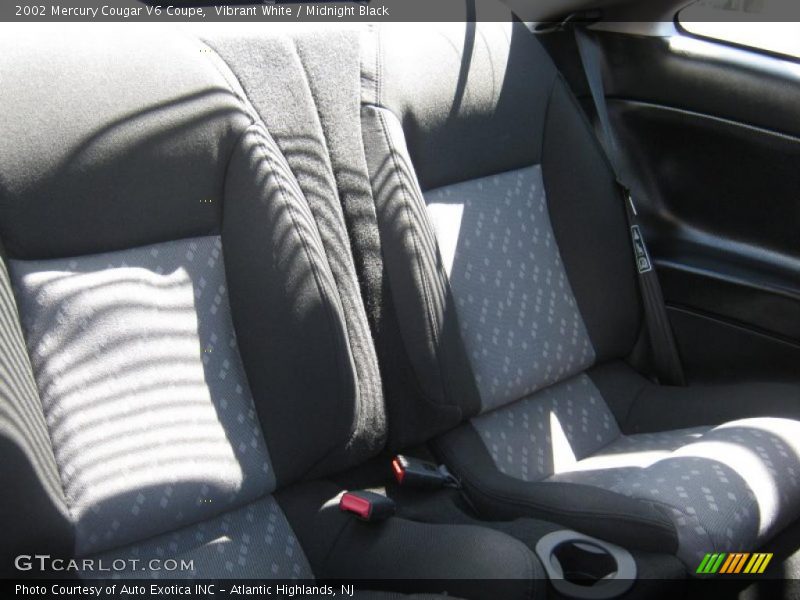 Vibrant White / Midnight Black 2002 Mercury Cougar V6 Coupe