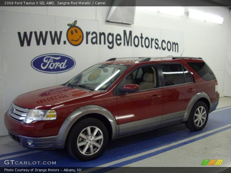 Sangria Red Metallic / Camel 2009 Ford Taurus X SEL AWD