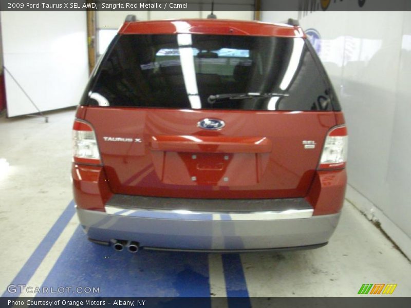 Sangria Red Metallic / Camel 2009 Ford Taurus X SEL AWD
