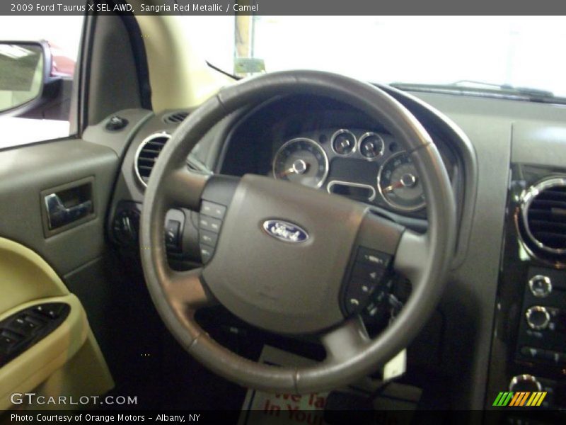 Sangria Red Metallic / Camel 2009 Ford Taurus X SEL AWD