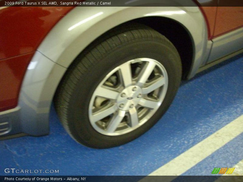 Sangria Red Metallic / Camel 2009 Ford Taurus X SEL AWD