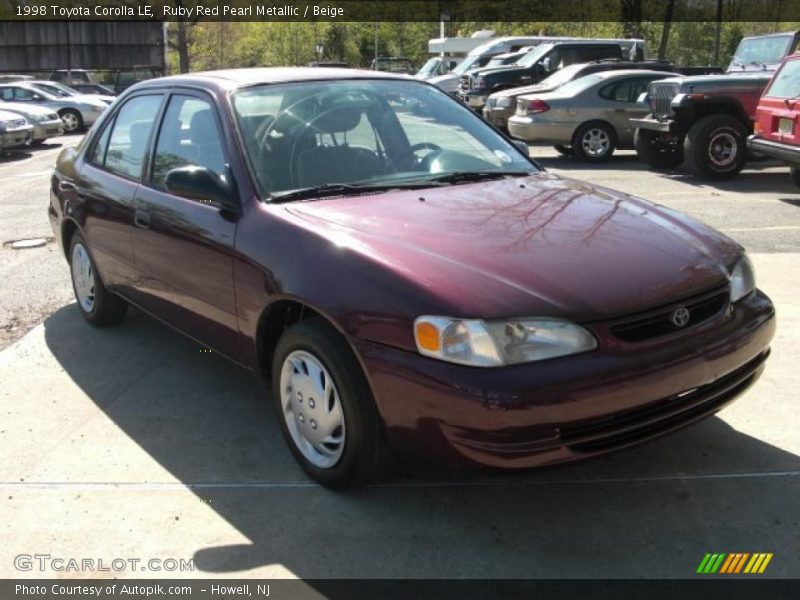 Ruby Red Pearl Metallic / Beige 1998 Toyota Corolla LE