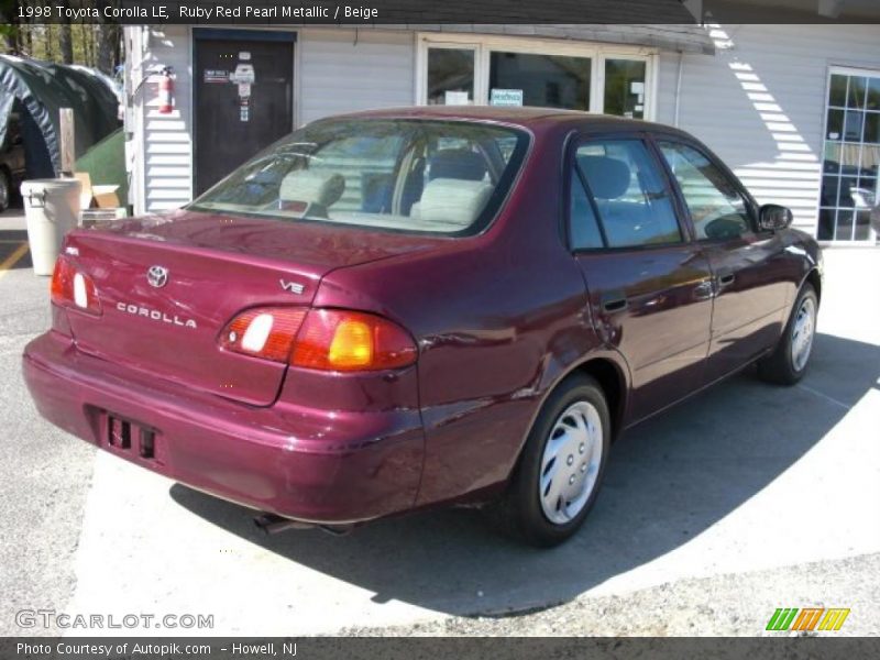 Ruby Red Pearl Metallic / Beige 1998 Toyota Corolla LE