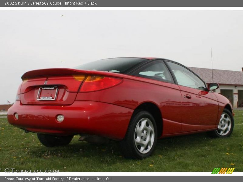 Bright Red / Black 2002 Saturn S Series SC2 Coupe