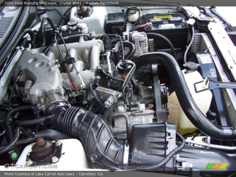 Crystal White / Medium Parchment 2000 Ford Mustang V6 Coupe