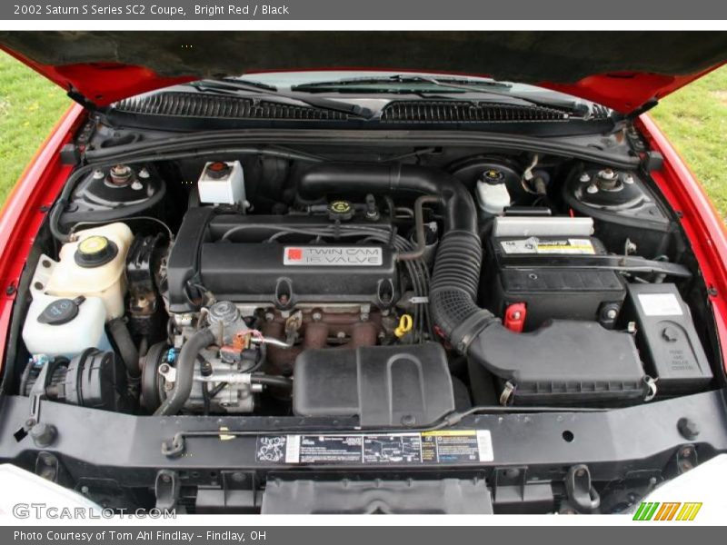 Bright Red / Black 2002 Saturn S Series SC2 Coupe