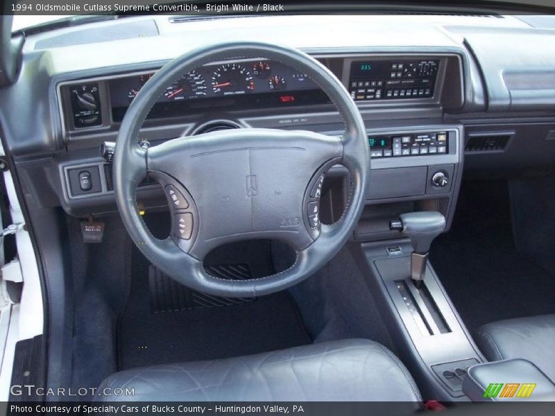 Bright White / Black 1994 Oldsmobile Cutlass Supreme Convertible