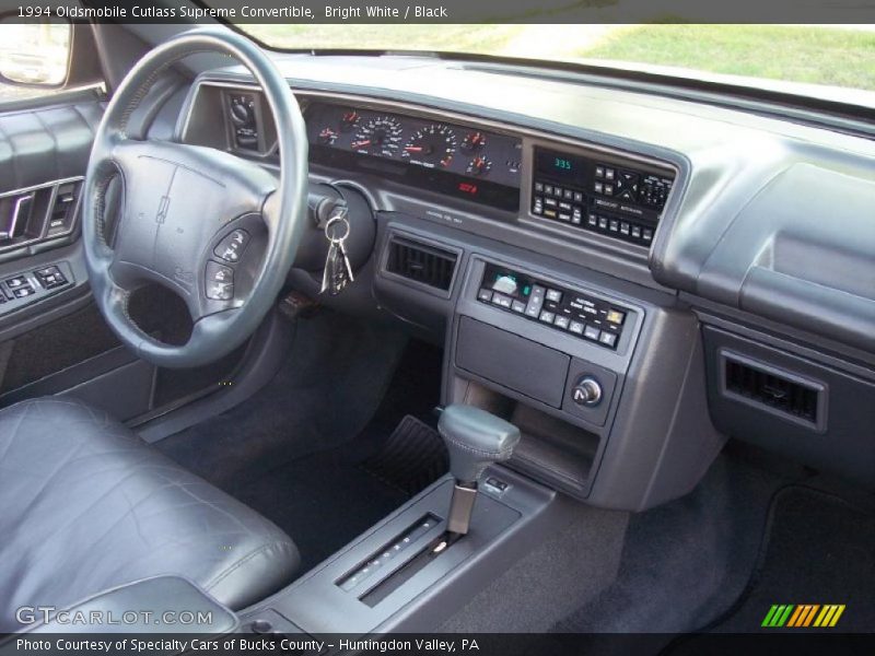 Bright White / Black 1994 Oldsmobile Cutlass Supreme Convertible