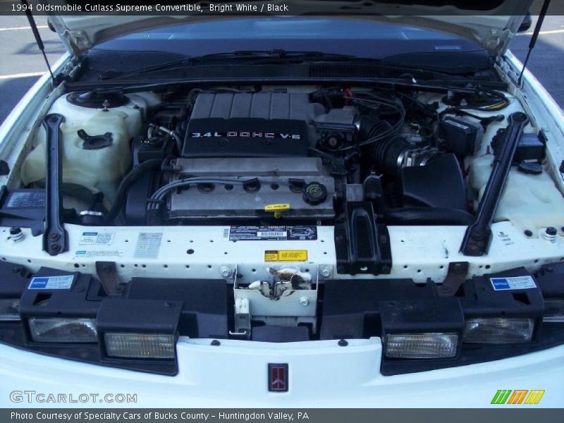 Bright White / Black 1994 Oldsmobile Cutlass Supreme Convertible