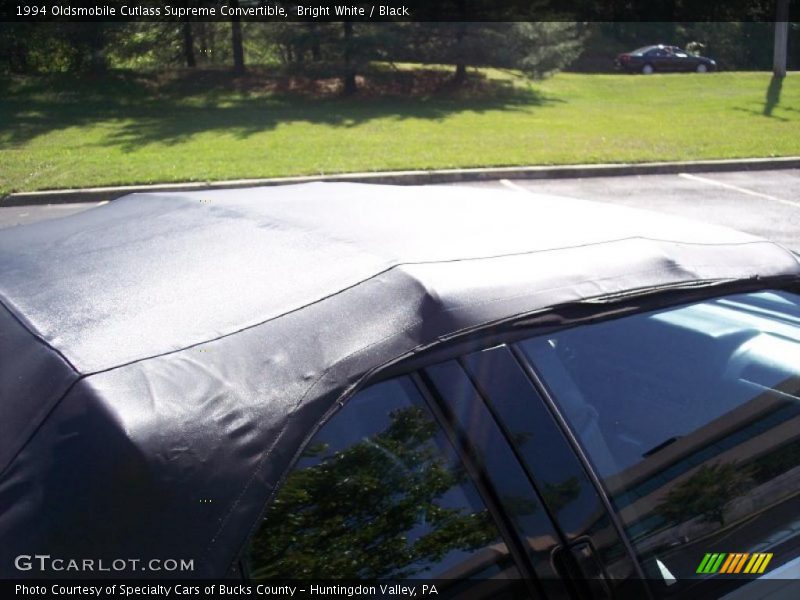 Bright White / Black 1994 Oldsmobile Cutlass Supreme Convertible