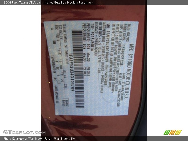 Merlot Metallic / Medium Parchment 2004 Ford Taurus SE Sedan