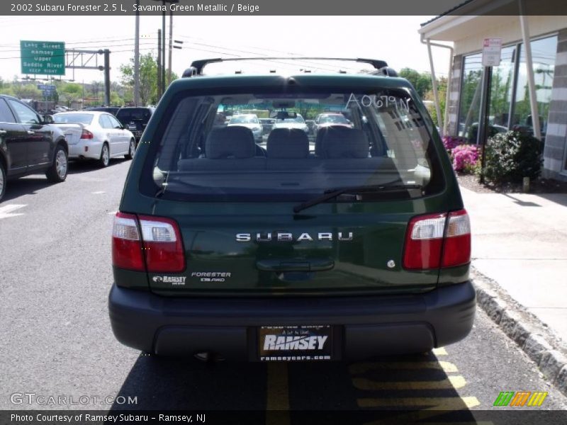 Savanna Green Metallic / Beige 2002 Subaru Forester 2.5 L