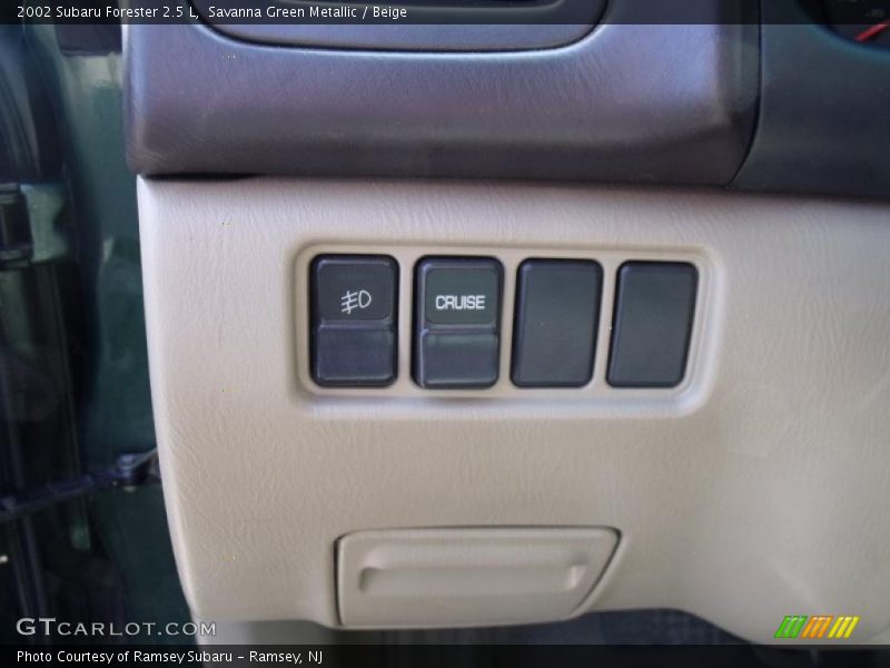 Savanna Green Metallic / Beige 2002 Subaru Forester 2.5 L
