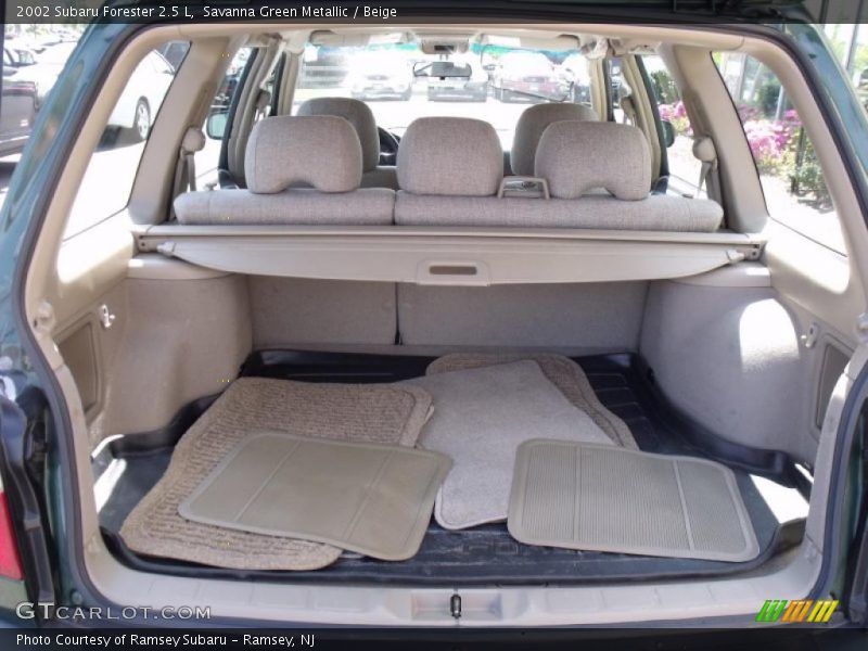 Savanna Green Metallic / Beige 2002 Subaru Forester 2.5 L