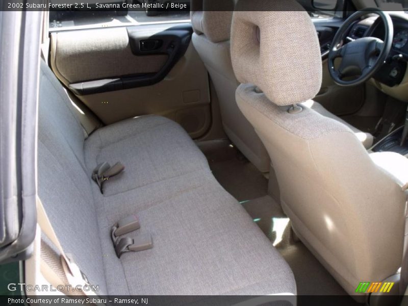 Savanna Green Metallic / Beige 2002 Subaru Forester 2.5 L