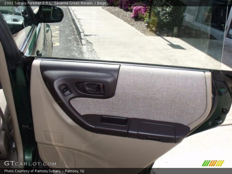 Savanna Green Metallic / Beige 2002 Subaru Forester 2.5 L