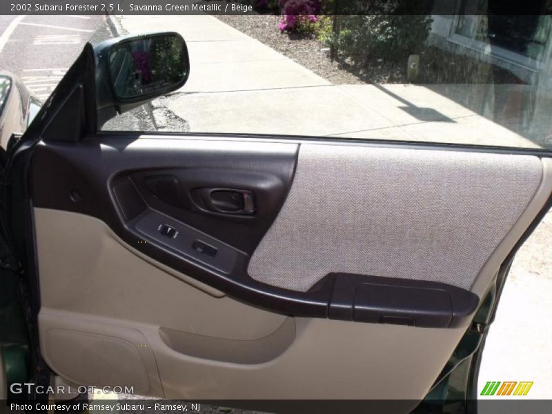 Savanna Green Metallic / Beige 2002 Subaru Forester 2.5 L
