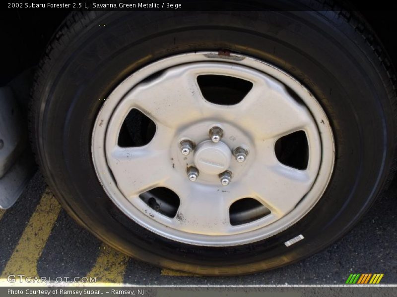 Savanna Green Metallic / Beige 2002 Subaru Forester 2.5 L