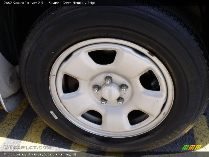 Savanna Green Metallic / Beige 2002 Subaru Forester 2.5 L