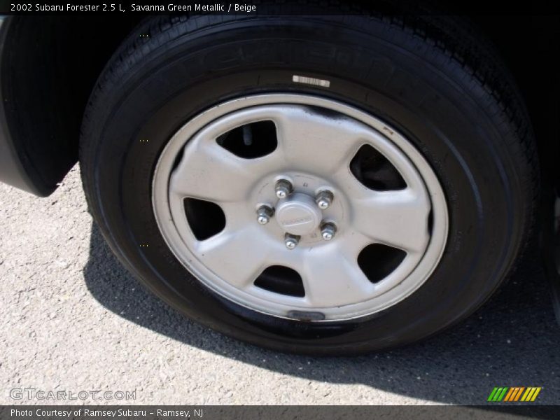 Savanna Green Metallic / Beige 2002 Subaru Forester 2.5 L