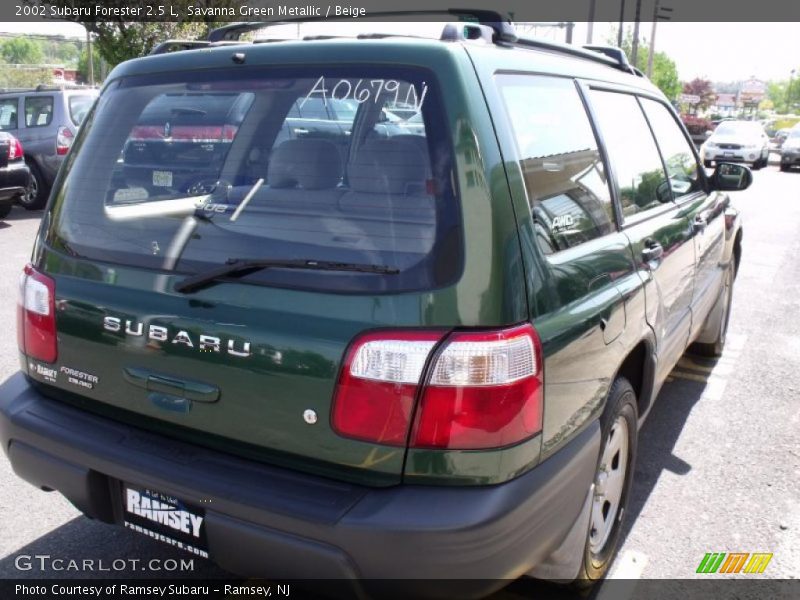 Savanna Green Metallic / Beige 2002 Subaru Forester 2.5 L