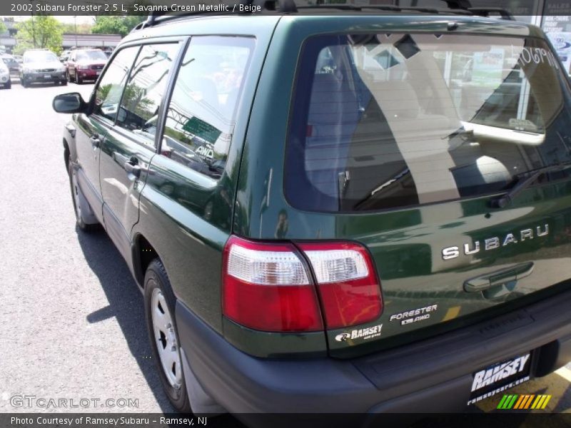 Savanna Green Metallic / Beige 2002 Subaru Forester 2.5 L