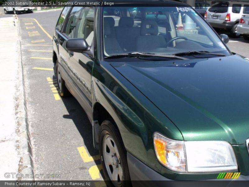 Savanna Green Metallic / Beige 2002 Subaru Forester 2.5 L