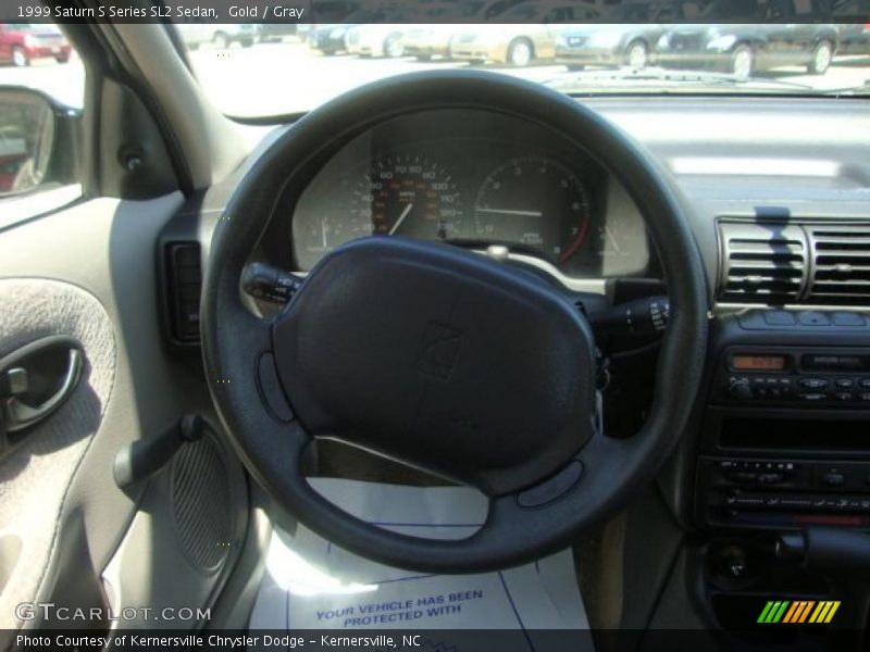 Gold / Gray 1999 Saturn S Series SL2 Sedan