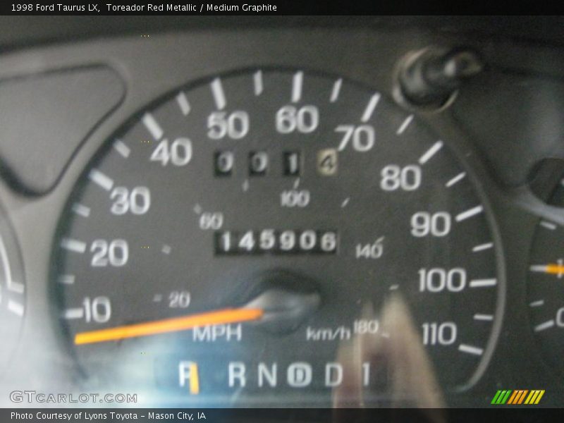 Toreador Red Metallic / Medium Graphite 1998 Ford Taurus LX