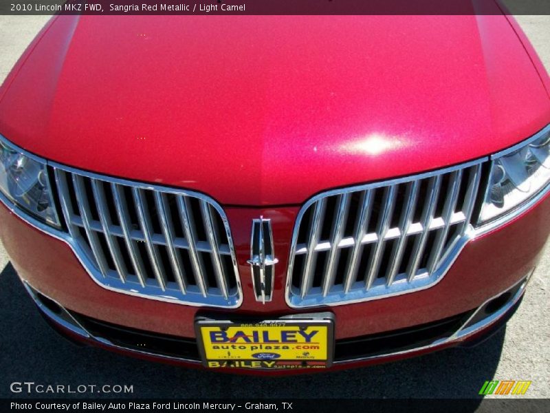 Sangria Red Metallic / Light Camel 2010 Lincoln MKZ FWD