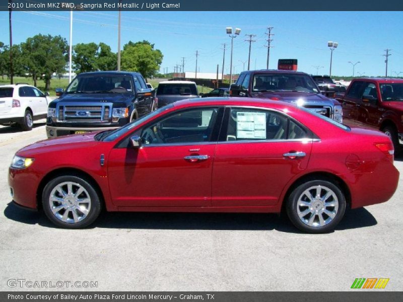 Sangria Red Metallic / Light Camel 2010 Lincoln MKZ FWD