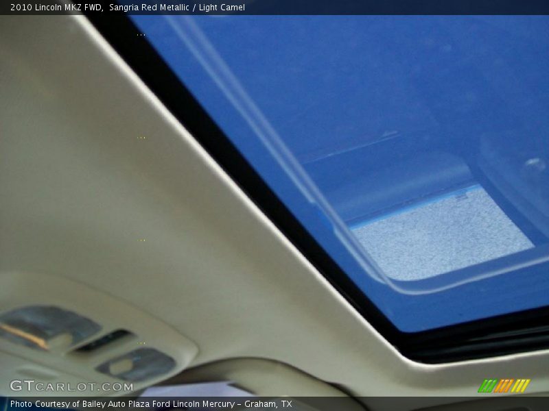 Sangria Red Metallic / Light Camel 2010 Lincoln MKZ FWD