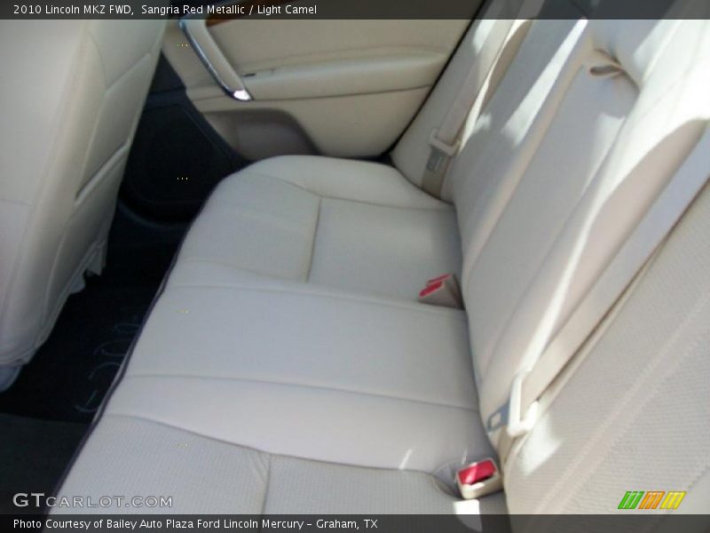 Sangria Red Metallic / Light Camel 2010 Lincoln MKZ FWD