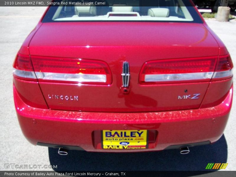 Sangria Red Metallic / Light Camel 2010 Lincoln MKZ FWD