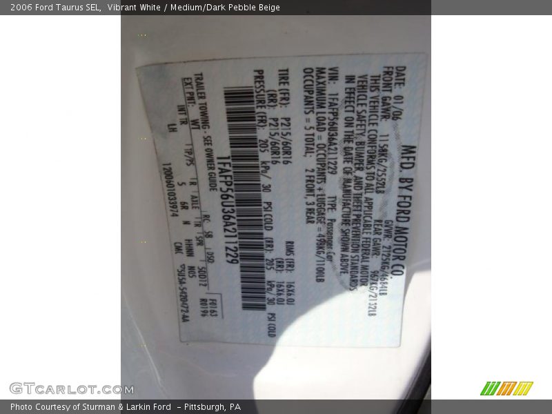 Vibrant White / Medium/Dark Pebble Beige 2006 Ford Taurus SEL