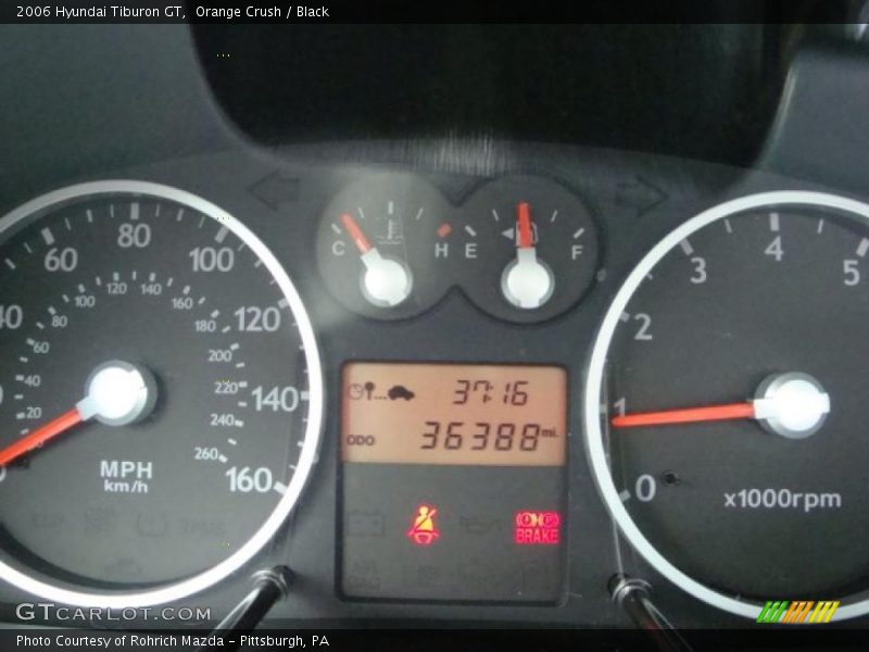 Orange Crush / Black 2006 Hyundai Tiburon GT