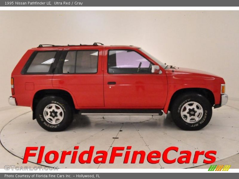 Ultra Red / Gray 1995 Nissan Pathfinder LE