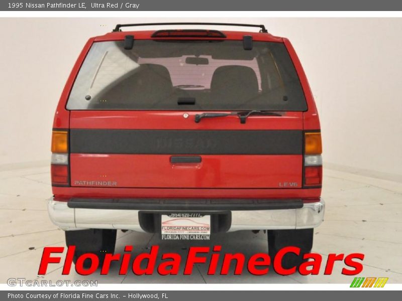 Ultra Red / Gray 1995 Nissan Pathfinder LE