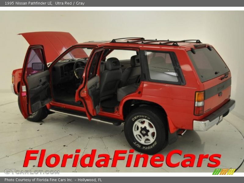 Ultra Red / Gray 1995 Nissan Pathfinder LE