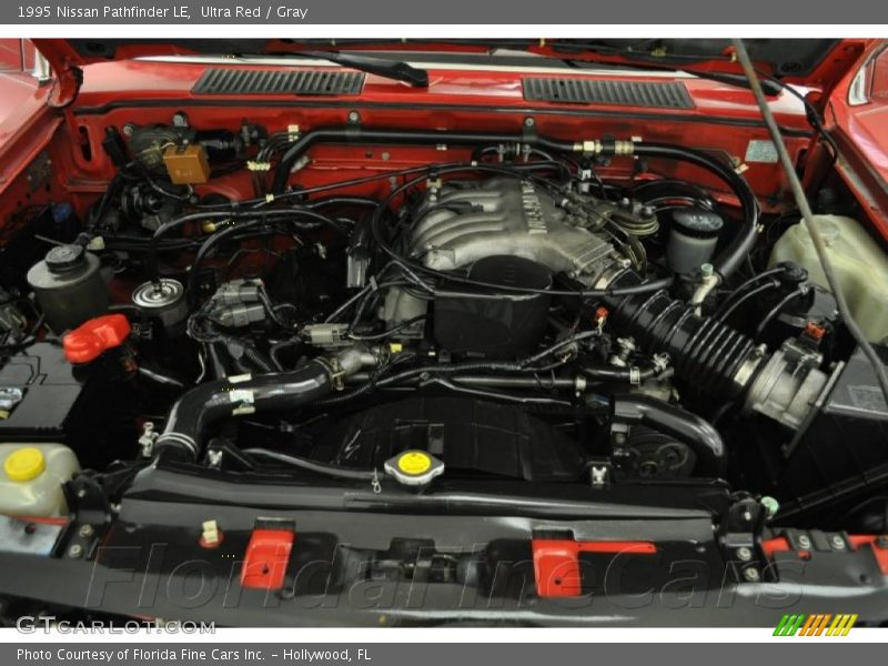 Ultra Red / Gray 1995 Nissan Pathfinder LE